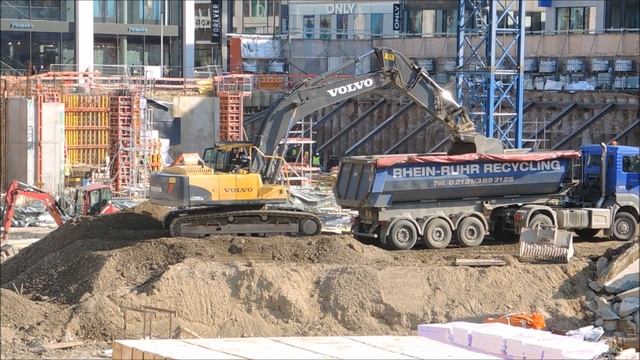 Großbaustelle und Volvo EC 290 lädt LKW Sachstand Ende Februar смотреть онлайн