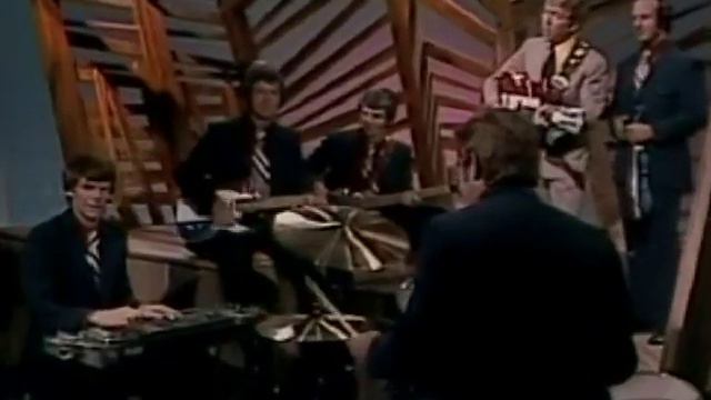 Buck Owens - Under Your Spell Again смотреть онлайн