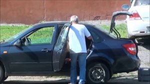 Погрузка кресла в Ладу Гранту седан