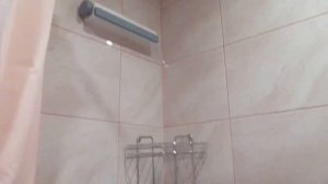 Настенное устройство для сушки белья в ванной