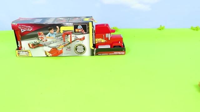 A Concrete Mixer And Other Toy Vehicles