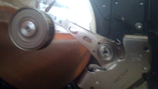 Тикает жесткий диск,помогите пожалуйста!!!