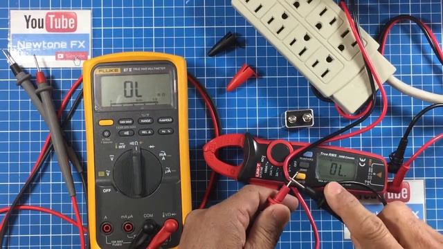 UNI-T UT210E Mini Clamp Meter Amperimetro de Gancho Vs Fluke 87V смотреть онлайн