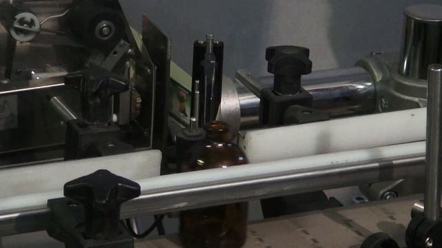 Этикетировочная линия Нанесение круговой этикетки смотреть онлайн