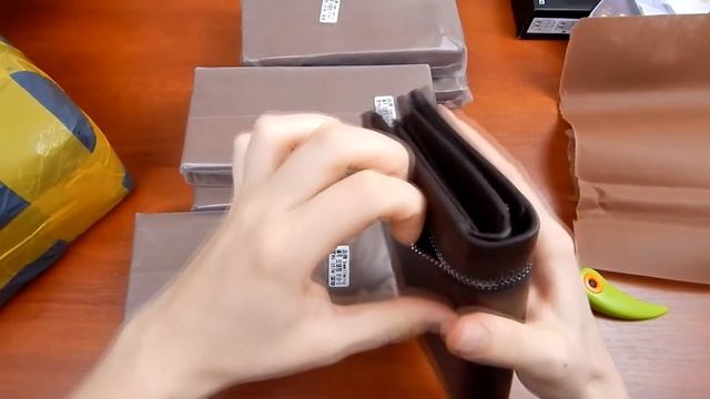 Посылки из Китая: Портмоне Baellerry,Моноподы,Телефон Doodge x5 смотреть онлайн