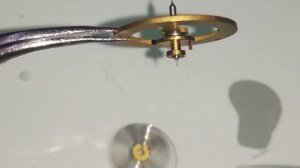 Часы. Замена оси баланса.