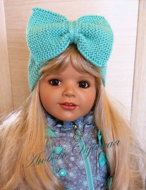 Детская повязка с бантом.