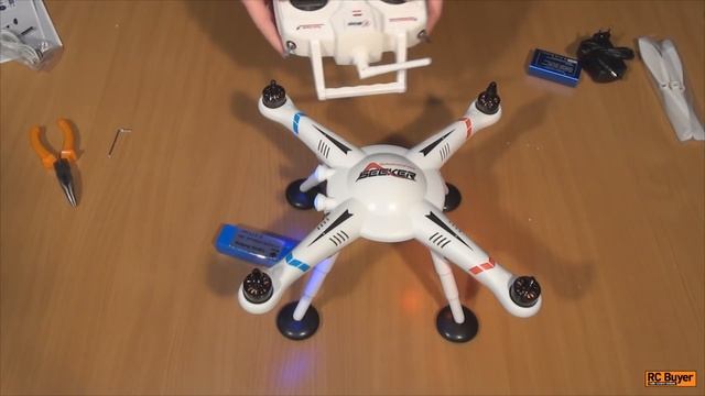 Дешевый квадрокоптер для съемок с GPS, Wltoys V303 Seeker, распаковка и полет смотреть онлайн