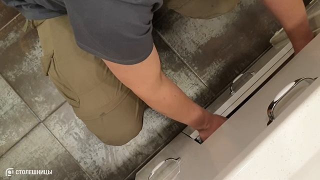 Столешница с опорой в пол над стиральной машиной и монолитной раковиной. ЖК "Сигма". смотреть онлайн