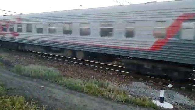 ЭП1М-579 с пассажирским поездом Белгород-Новосибирск №124В с прицепными вагонами Белгород-Саратов смотреть онлайн