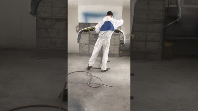 Spraying clear coat on bumper смотреть онлайн