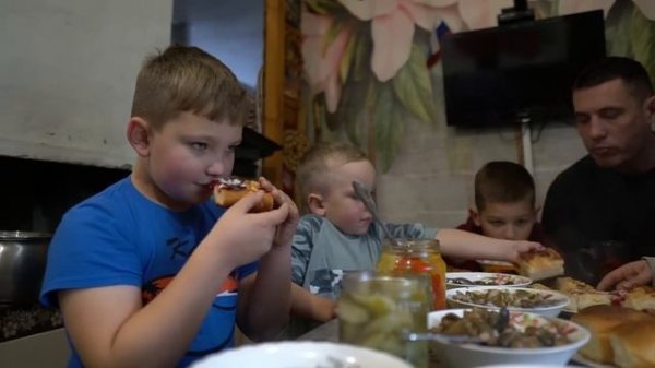 The family came to the village to visit their mother. Life in a Russian village. Family is together