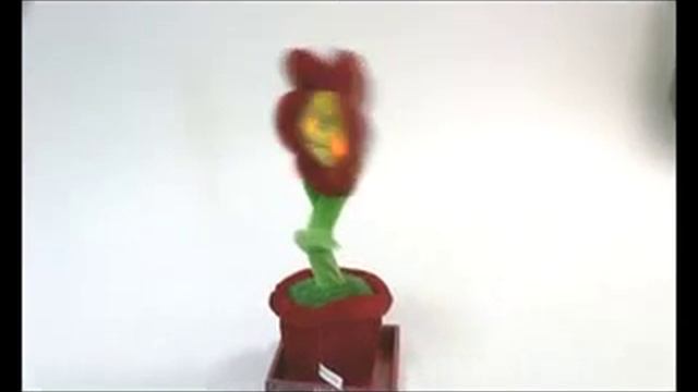 Игрушка "Цветок в горшке" поет, танцует, светится, 32см смотреть онлайн