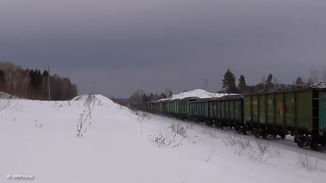Газотурбовоз ГТ1h-002 и тепловоз 2ТЭ116-1428 с грузовым поездом весом 9000 тонн смотреть онлайн