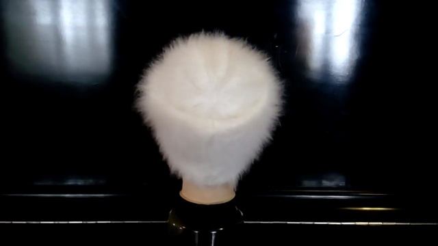 Шапка пуховая