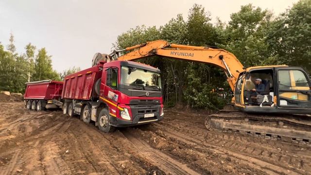 VOLVO FMX 420 впечатляющий процесс по вызволению застрявшего самосвала с прицепом груз 40 м3 грунта смотреть онлайн