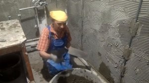 Цементная штукатурка бетонных стен под плитку