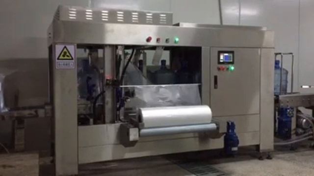 TECH-LONG (Тех-Лонг) Автоматическая машина по надеванию пакетов на бутыли 19 литров смотреть онлайн