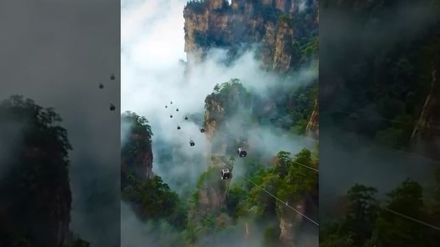 Пересекая море облаков.Национальный парк Чжанцзяцзе, Китай. смотреть онлайн