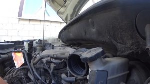 Где стартер у КИА Спортейдж 2.7 бензин 2006 года