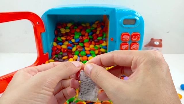 Oddly Satisfying Video L Full Of M&M's Candy In Toy Microwave And Other Surprises Cutting ASMR