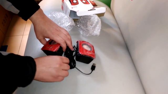 Распаковка Акустической система 2.0 Genius SP-U115 Red (31731006101) смотреть онлайн